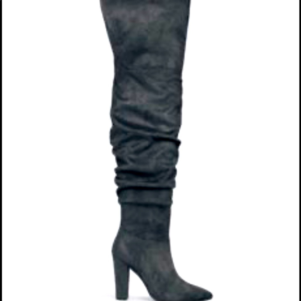 ShoeDazzle,thigh high,pointed boots. They are a size 9 with a slouchy fit.